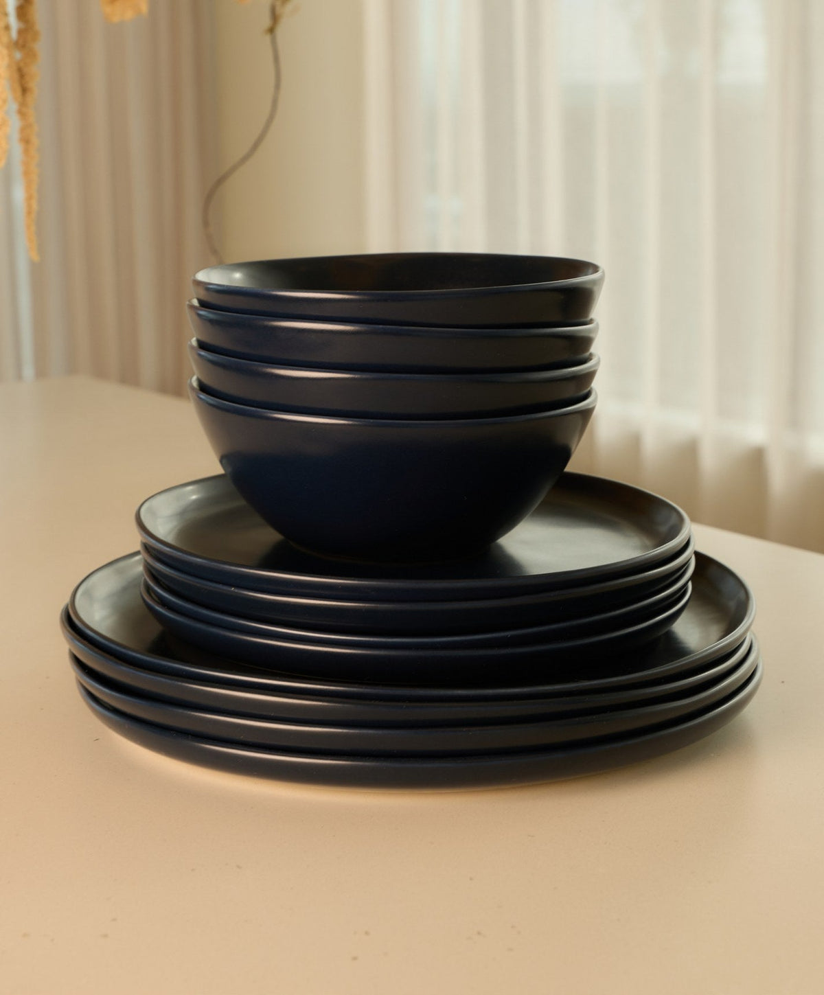 Dinner Plates by Fable Home, shown in Midnight Blue.