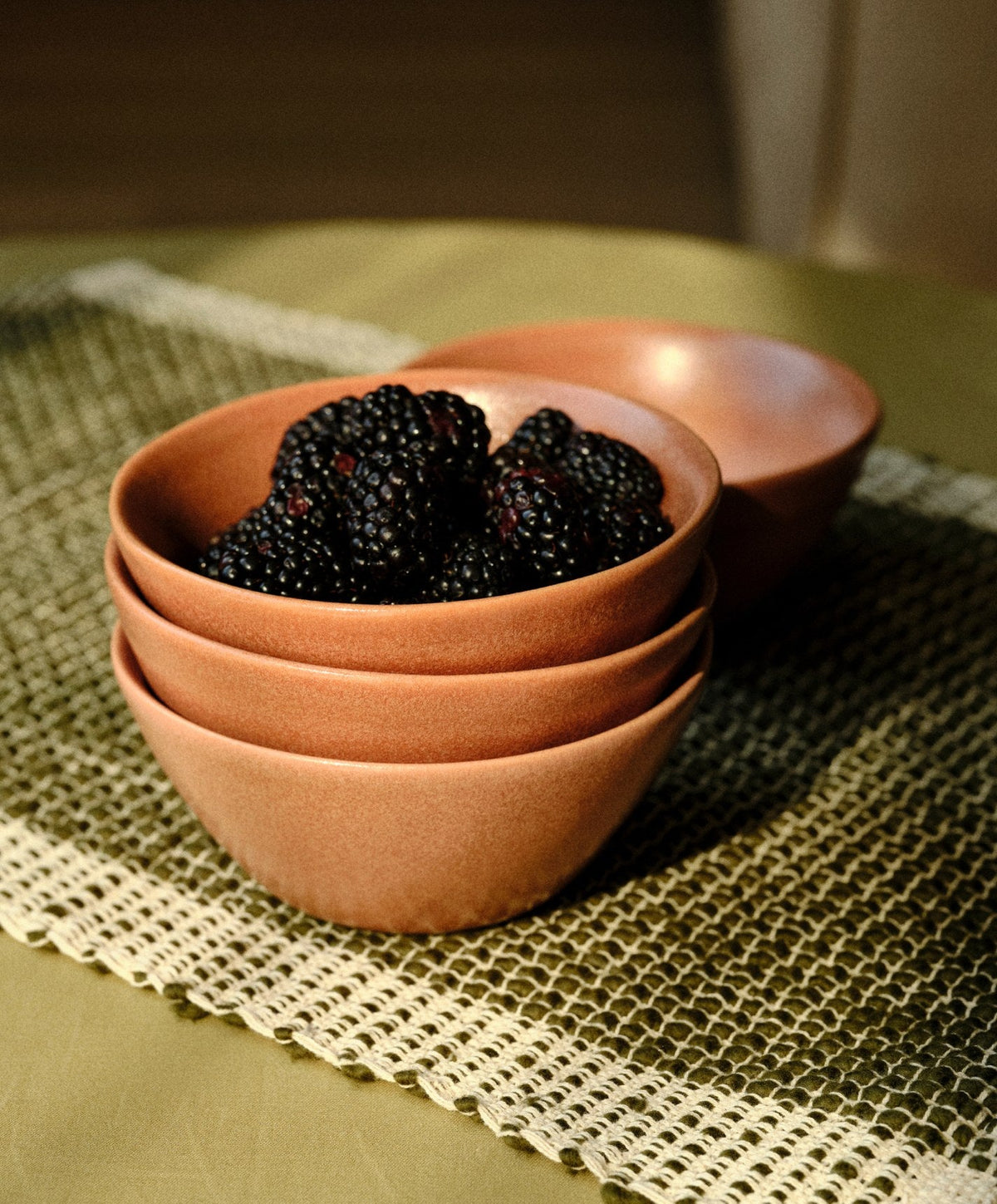 Little Bowls by Fable Home, shown in Canyon Clay.