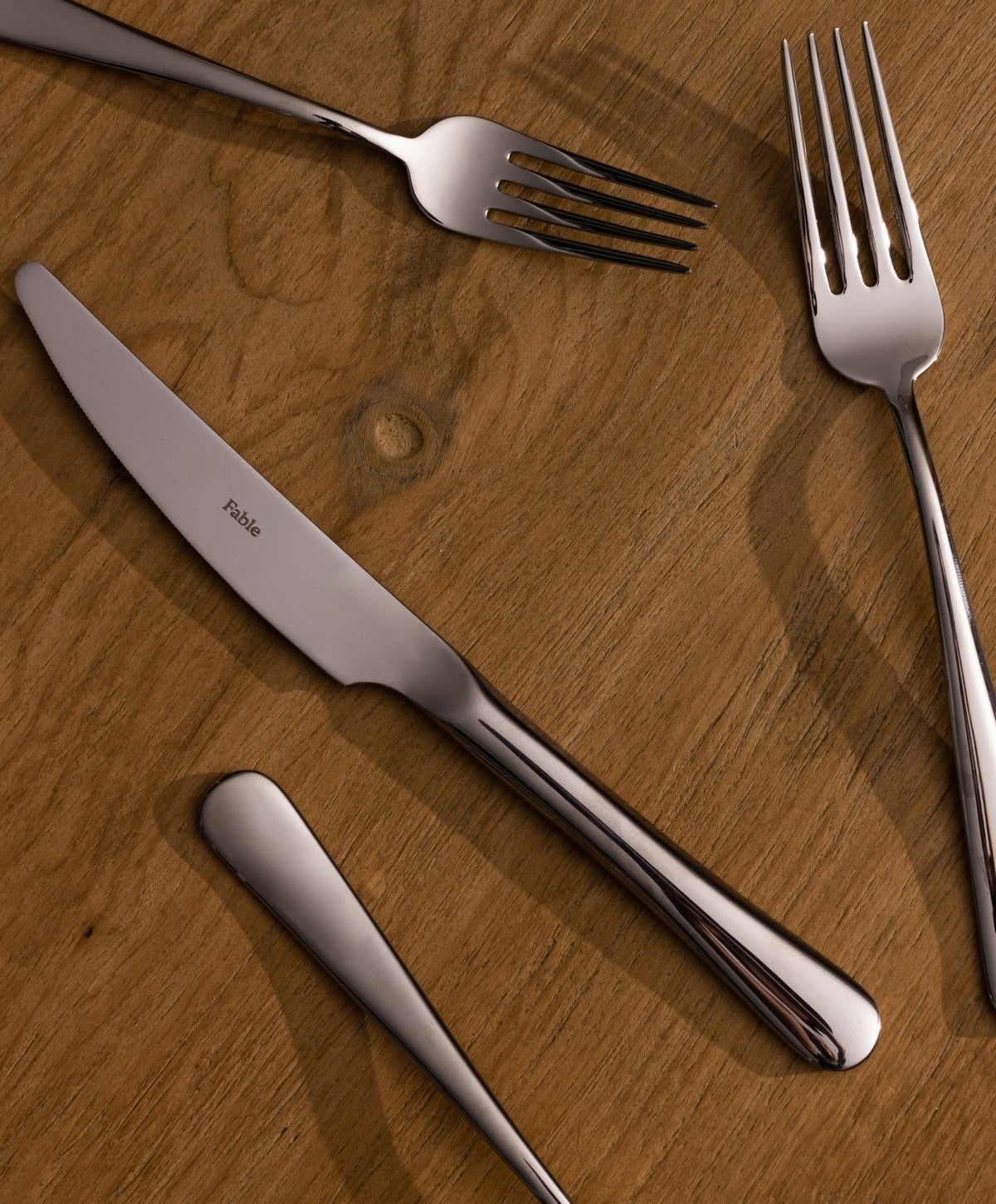 Flatware Set by Fable Home, shown in Polished Silver.
