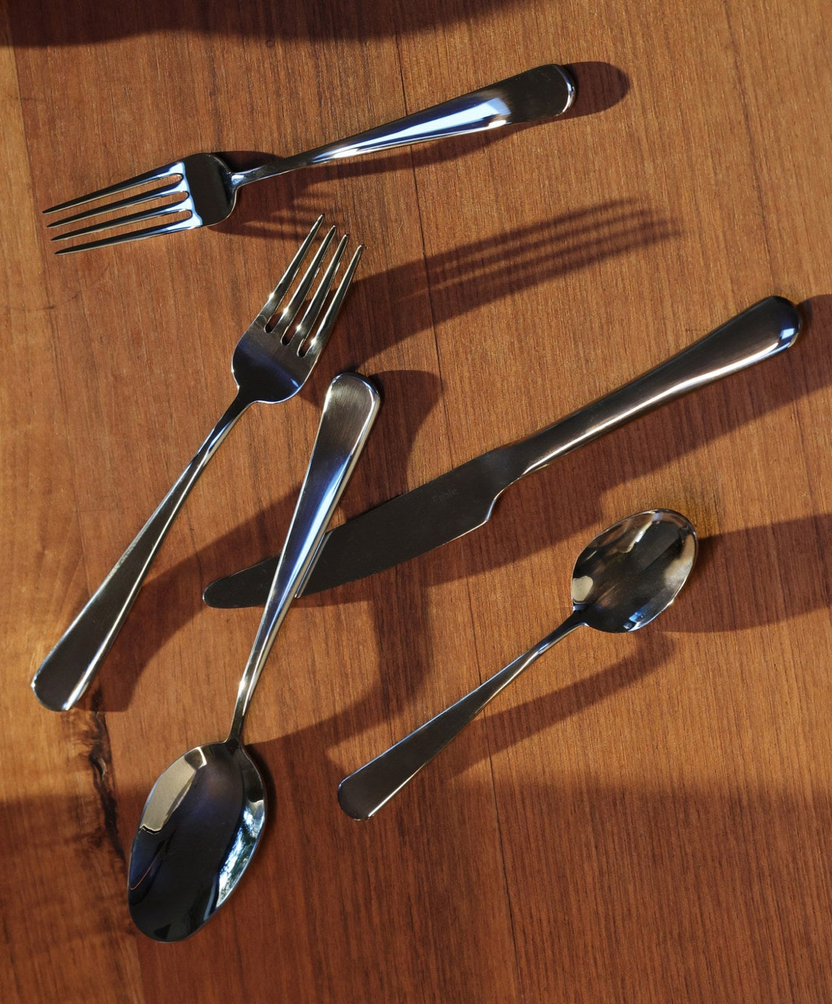 Flatware Set by Fable Home, shown in Polished Silver.
