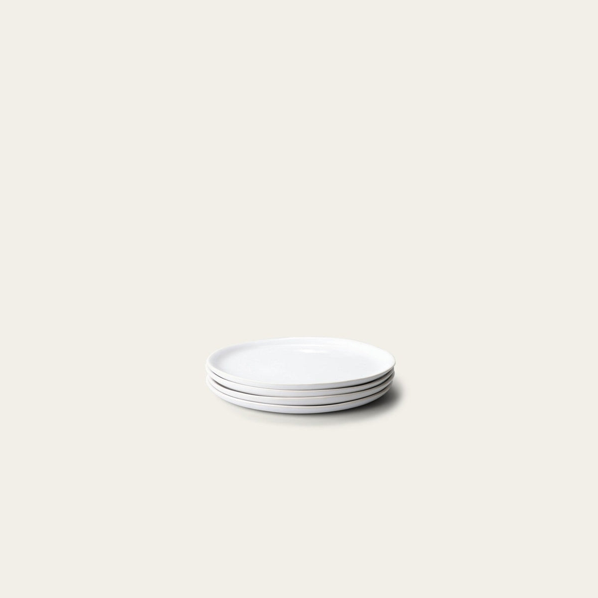 Dessert Plates by Fable Home, shown in Pearl White.