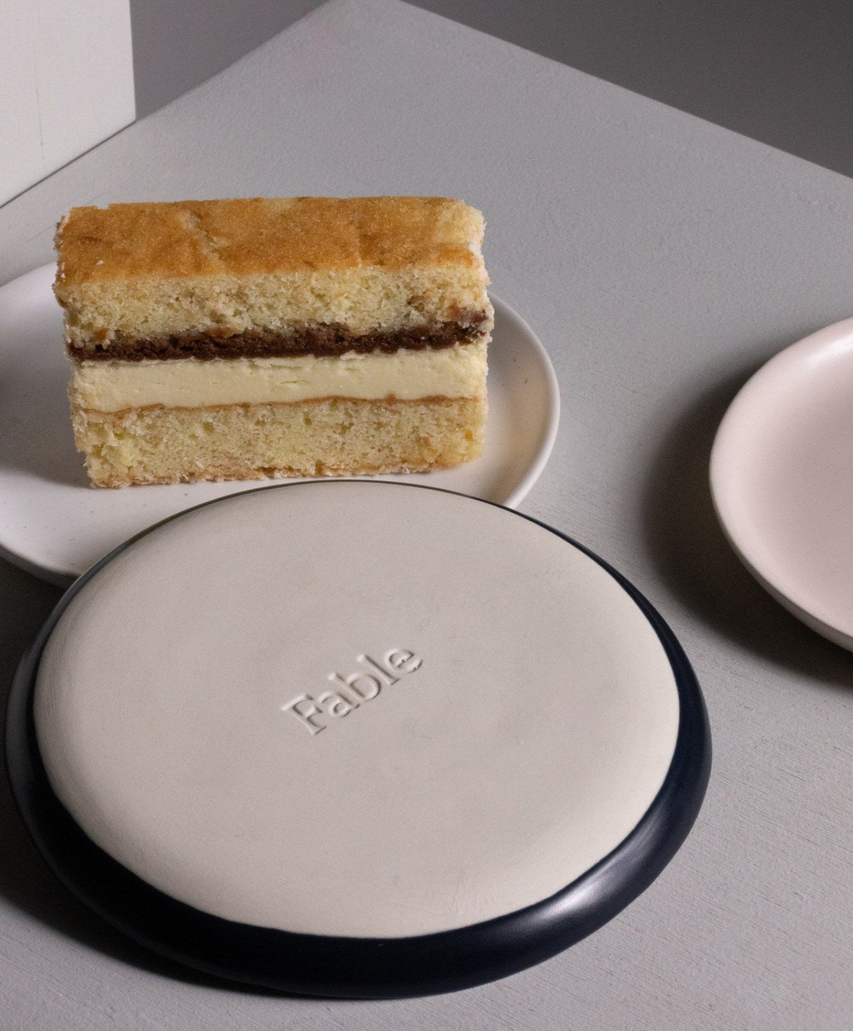 Dessert Plates by Fable Home, shown in Midnight Blue.