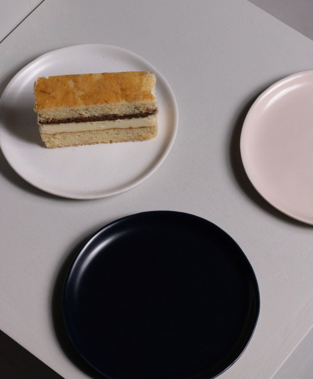 Dessert Plates by Fable Home, shown in Midnight Blue.