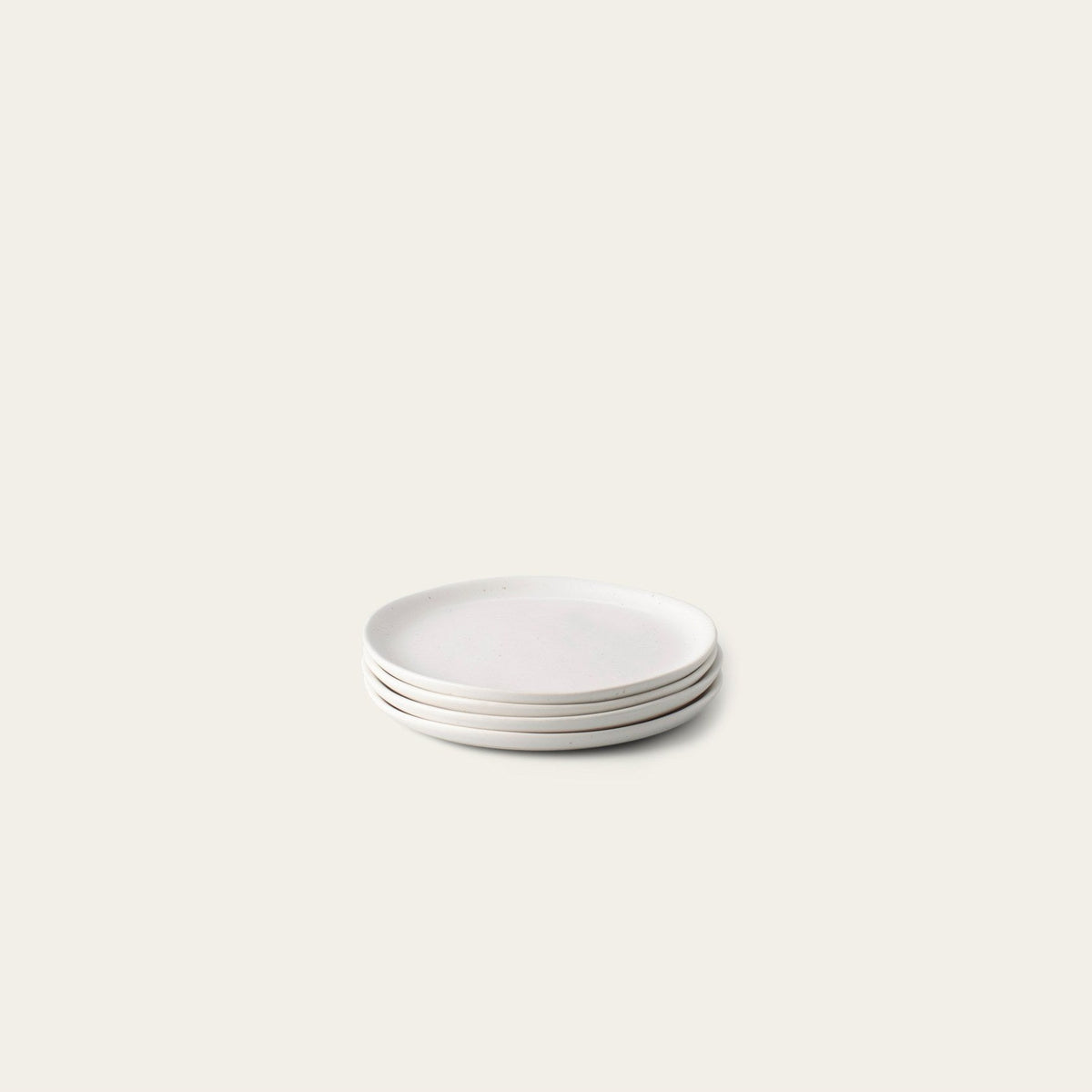 Dessert Plates by Fable Home, shown in Speckled White.
