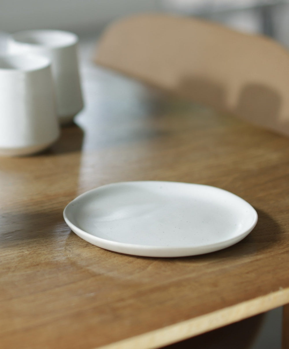 Dessert Plates by Fable Home, shown in Speckled White.