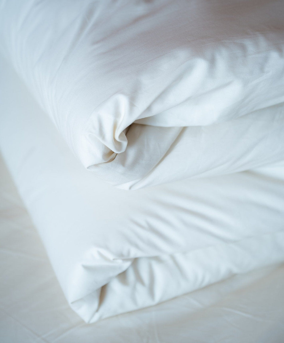 Percale Duvet Set by Fable Home, shown in Shell White.