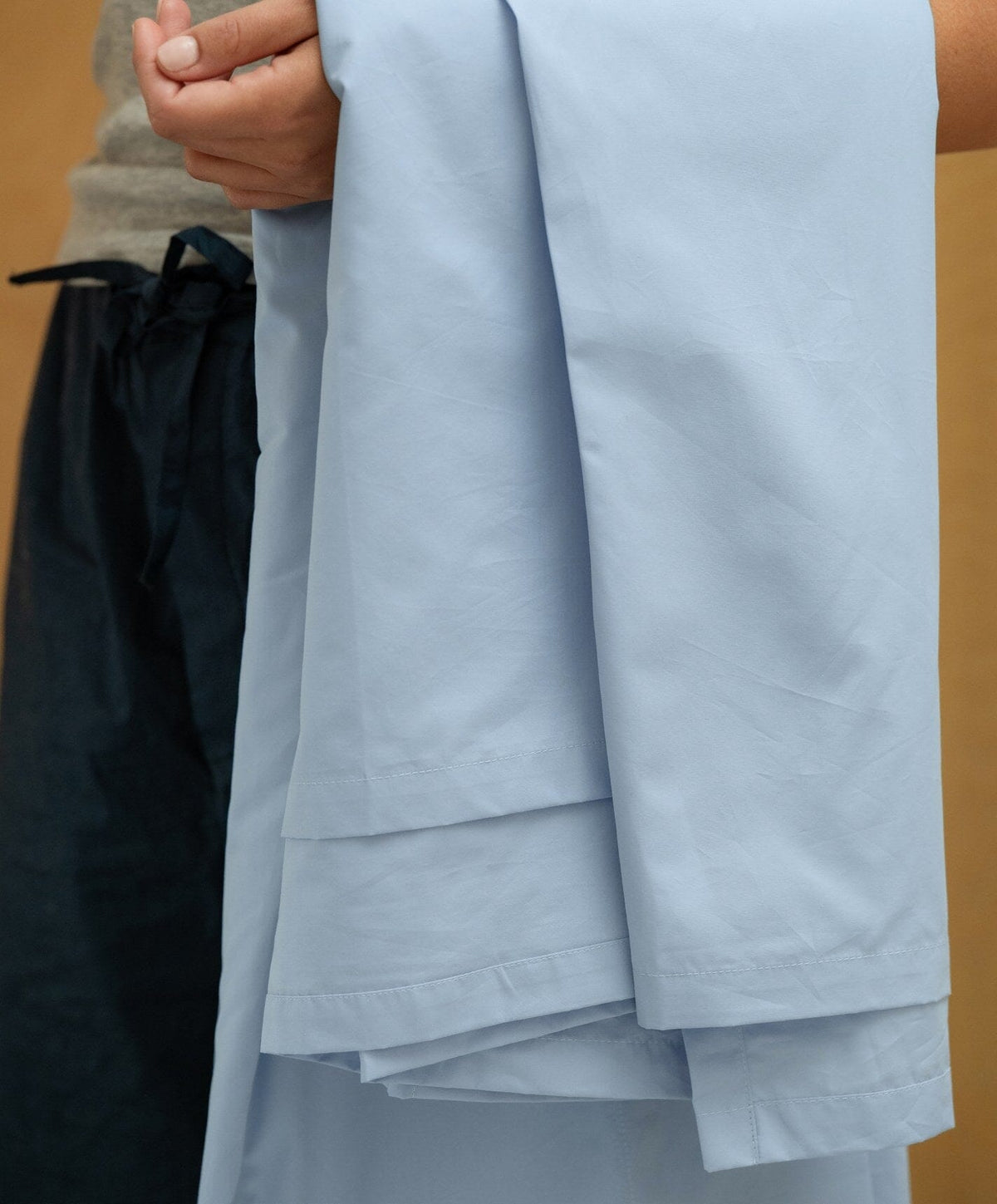 Percale Flat Sheet by Fable Home, shown in Meadow Blue.