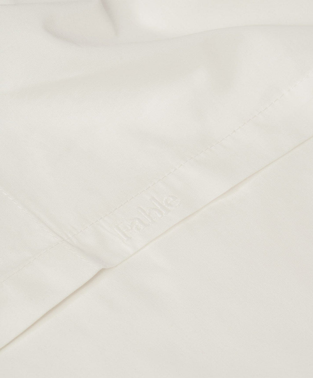 Percale Flat Sheet by Fable Home, shown in Shell White.
