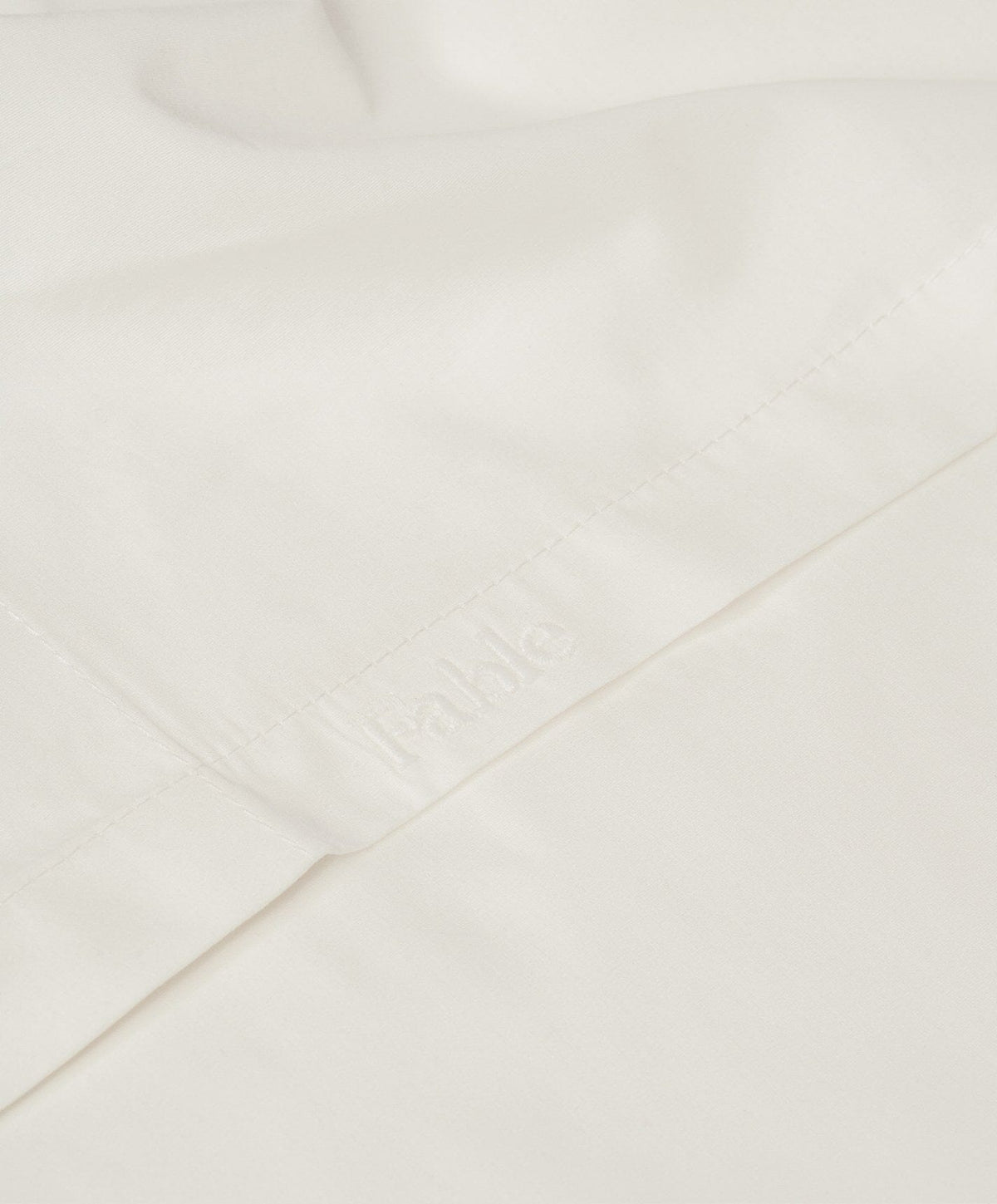 Percale Flat Sheet by Fable Home, shown in Shell White.