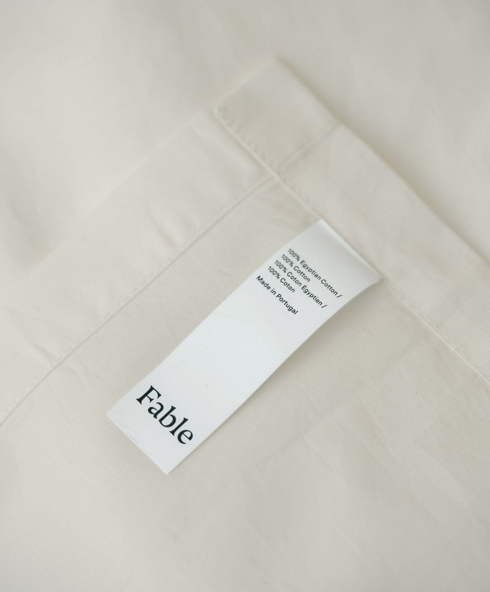 Percale Flat Sheet by Fable Home, shown in Shell White.