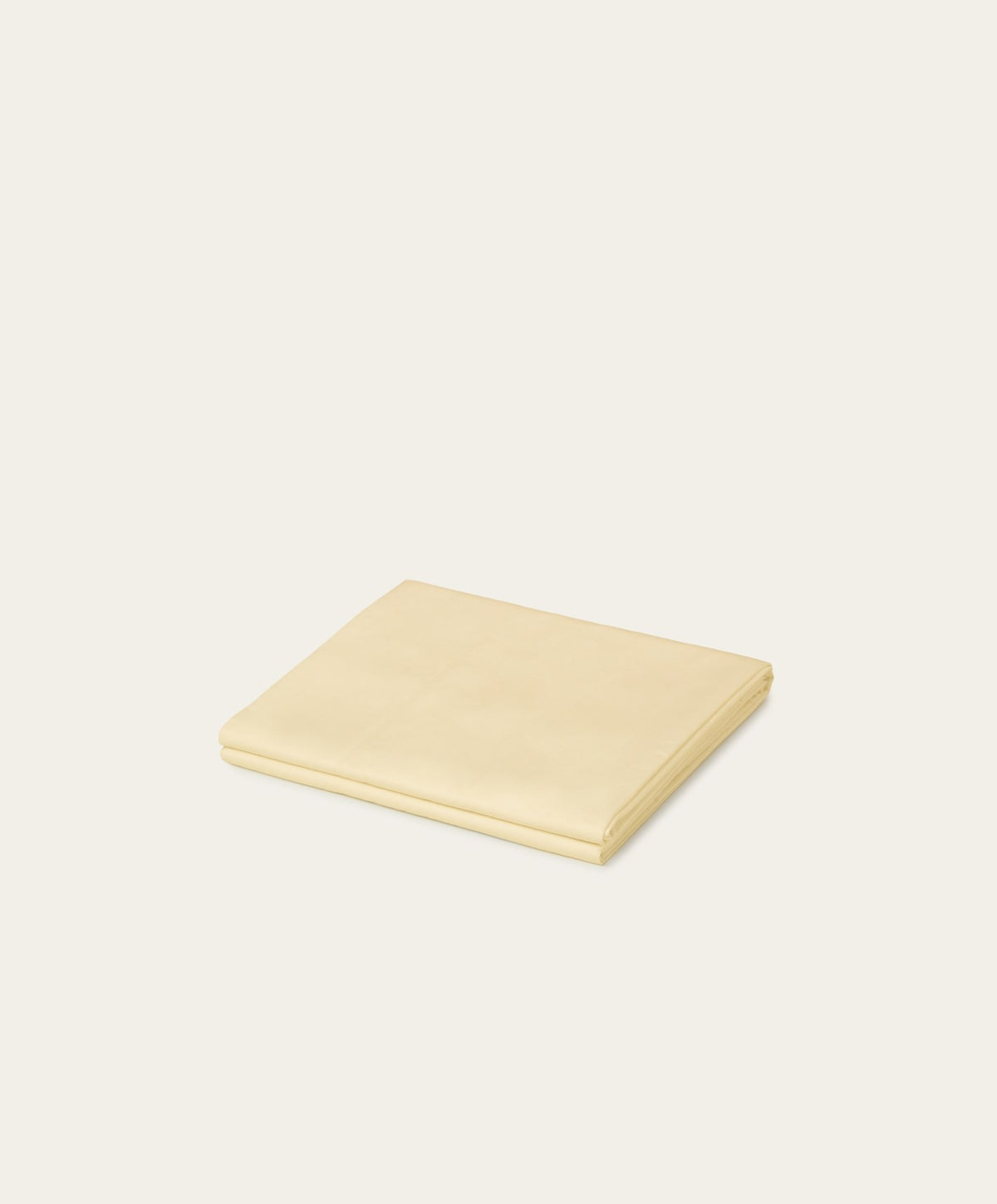 Percale Flat Sheet by Fable Home, shown in Buttercup Yellow.