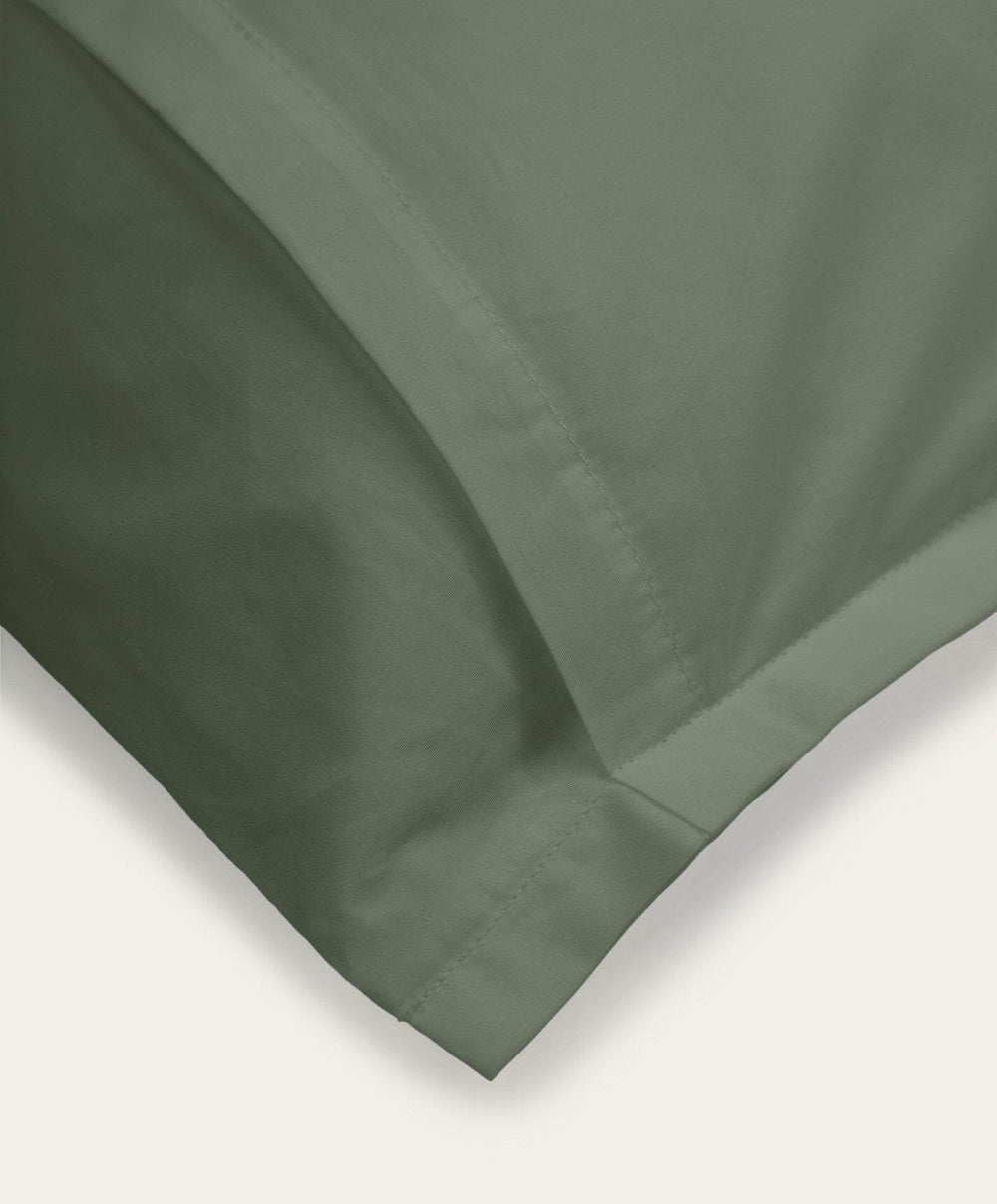 Percale Pillowcase Pair by Fable Home, shown in Juniper Green.