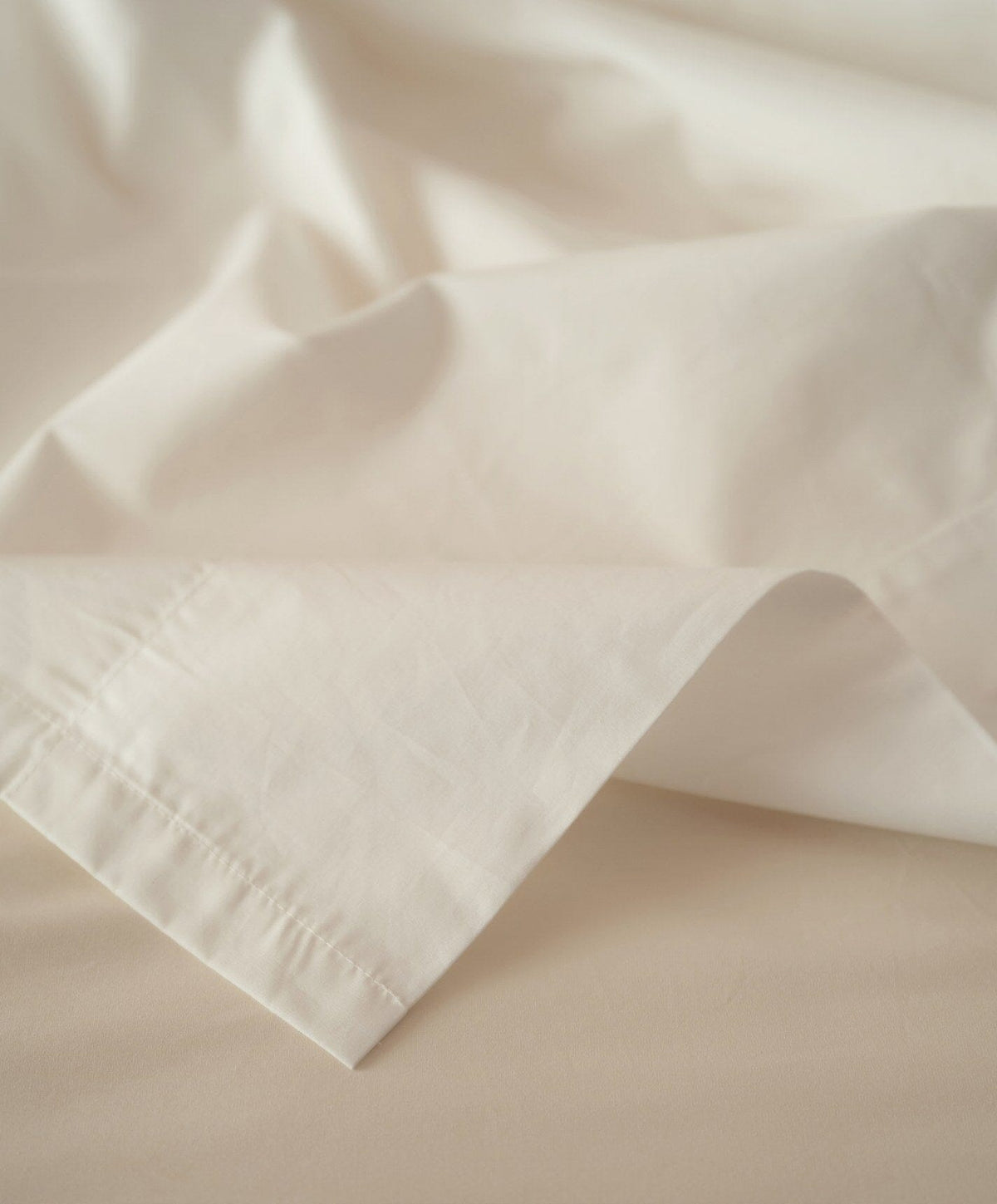 Percale Sheet Set by Fable Home, shown in Birch Sand.