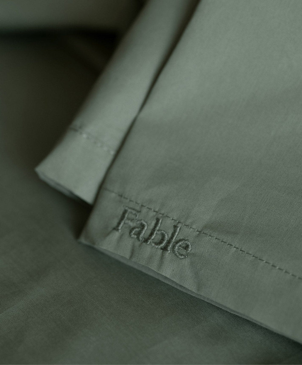 Percale Sheet Set by Fable Home, shown in Juniper Green.