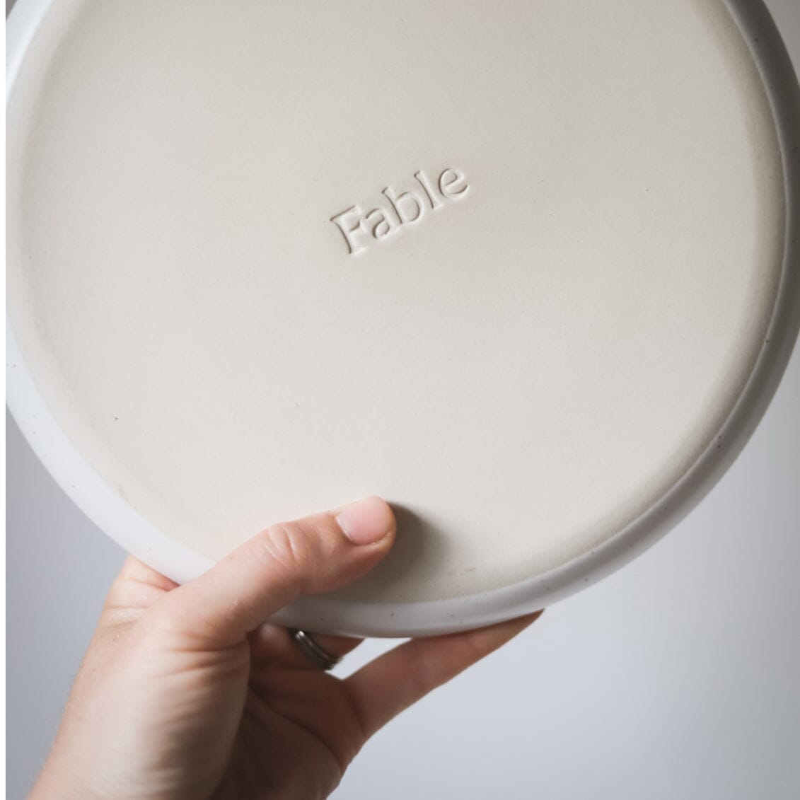 Serving platter dinnerware by Fable Home, shown in a dovegray finish.