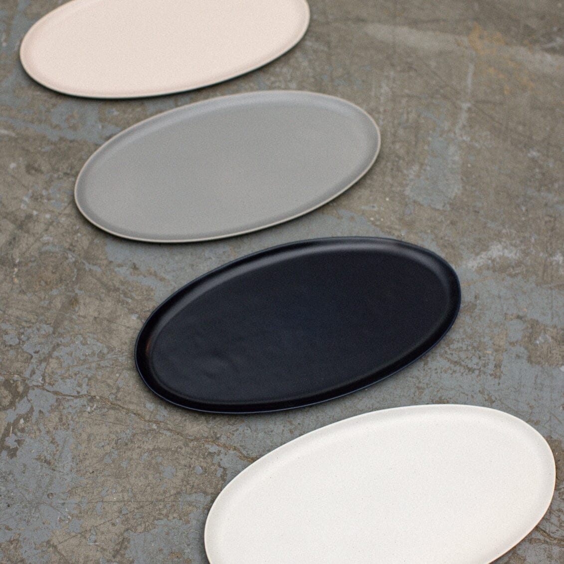 Serving platter set bundles by Fable Home, shown in a blushpink finish.