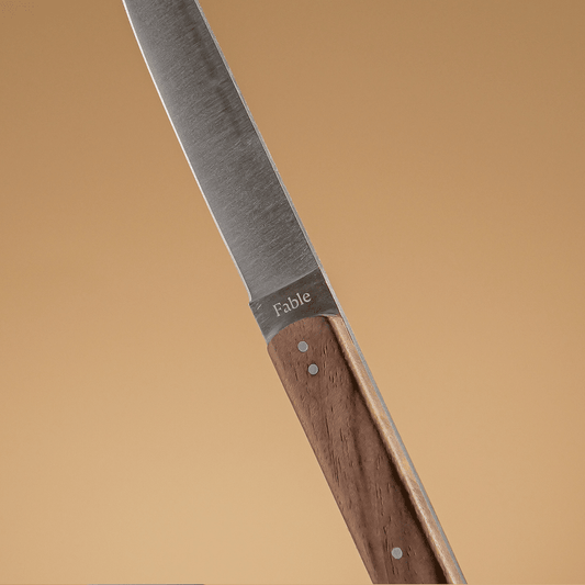 A knife on a light surface #walnut