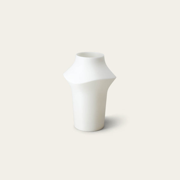 Curve table light lighting by Fable Home, shown in a translucent finish. – #translucent