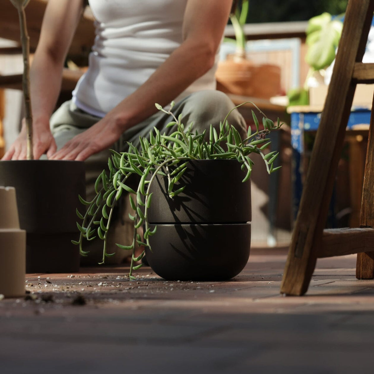 Planter planters by Fable Home, shown in a large/granitegray finish.