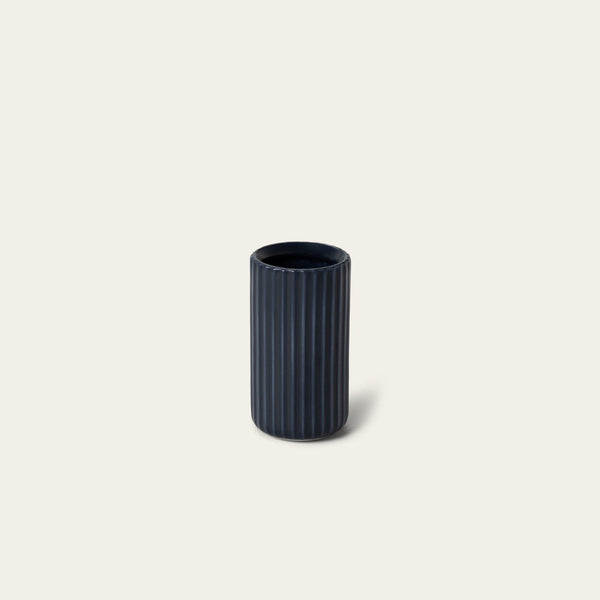 Short bud vase decor by Fable Home, shown in a midnightblue finish. – #midnightblue