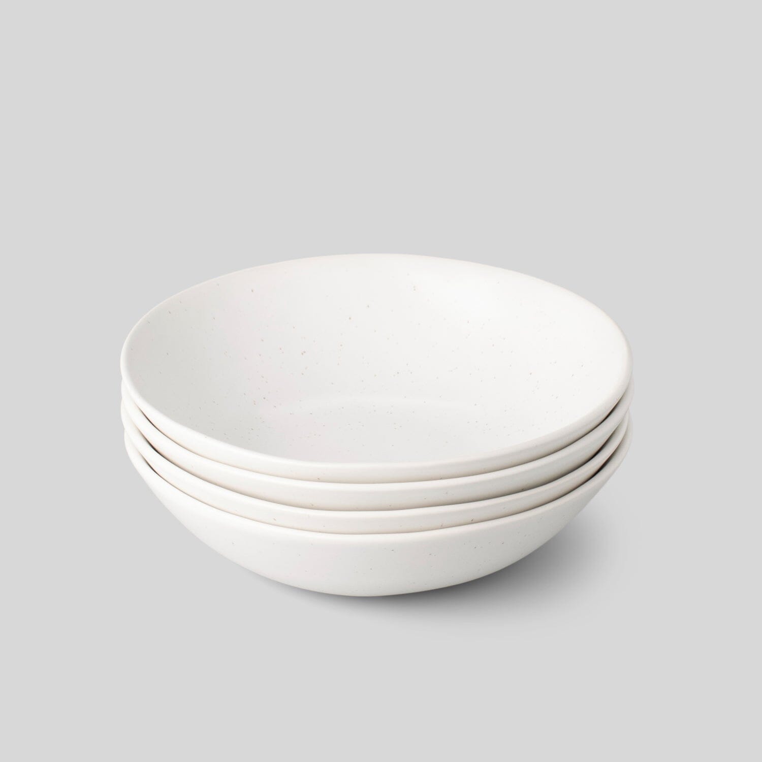 https://fable.com/cdn/shop/products/the-pasta-bowls-dinnerware-fable-home-speckled-white-358789_1500x.jpg?v=1670117985